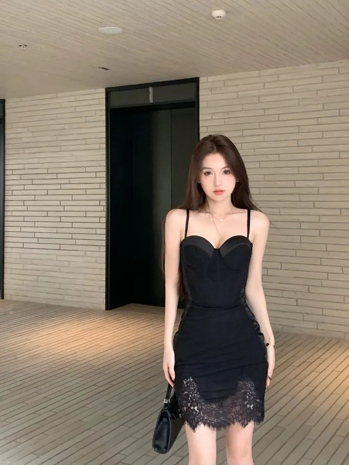 French-style sexy boned corset top paired with a lace hip-hugging skirt.