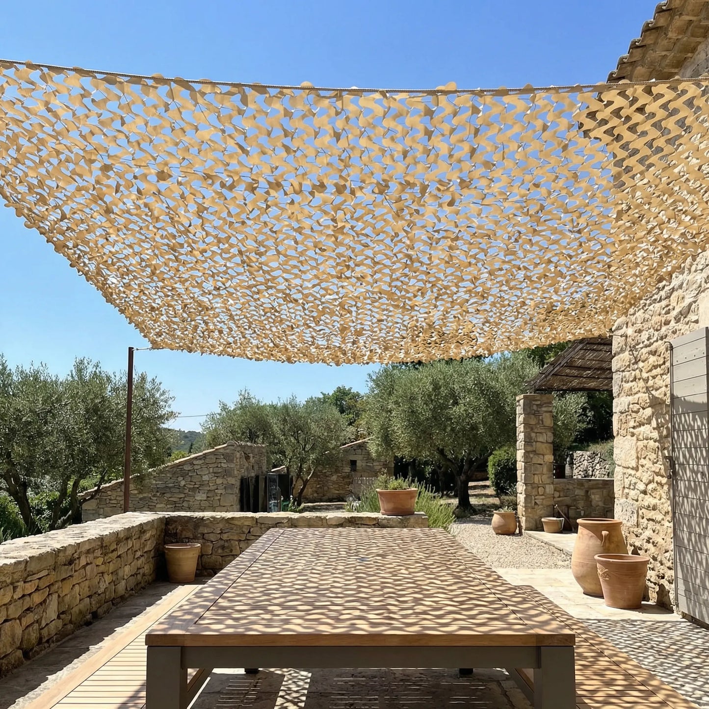 Reinforced sand-colored camouflage net for terraces and pergolas – Mediterranean style