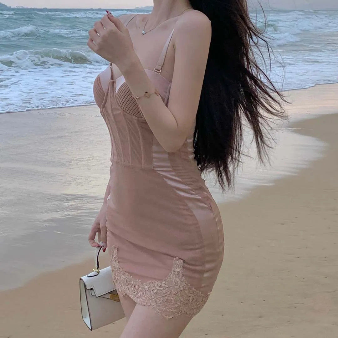 French-style sexy boned corset top paired with a lace hip-hugging skirt.