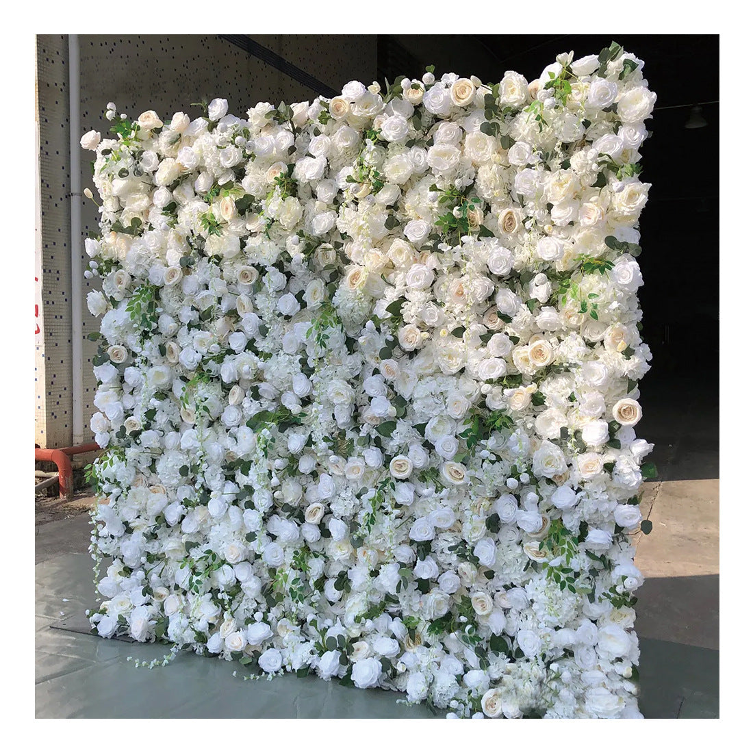 Hand-rolled fabric flower wall - perfect decoration for outdoor events