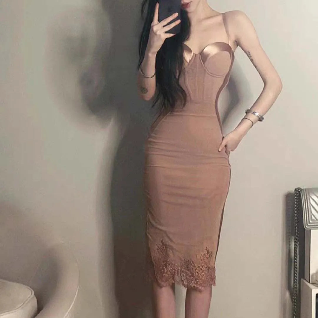 French-style sexy boned corset top paired with a lace hip-hugging skirt.